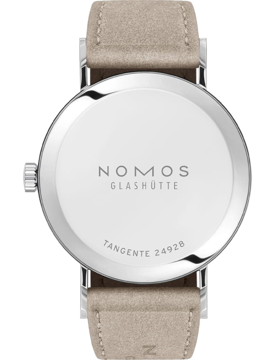 Back of a stainless steel Nomos Glashütte Tangente watch with a vegan velour leather strap; case back shows NOMOS GLASHÜTTE and TANGENTE 24928 inscriptions