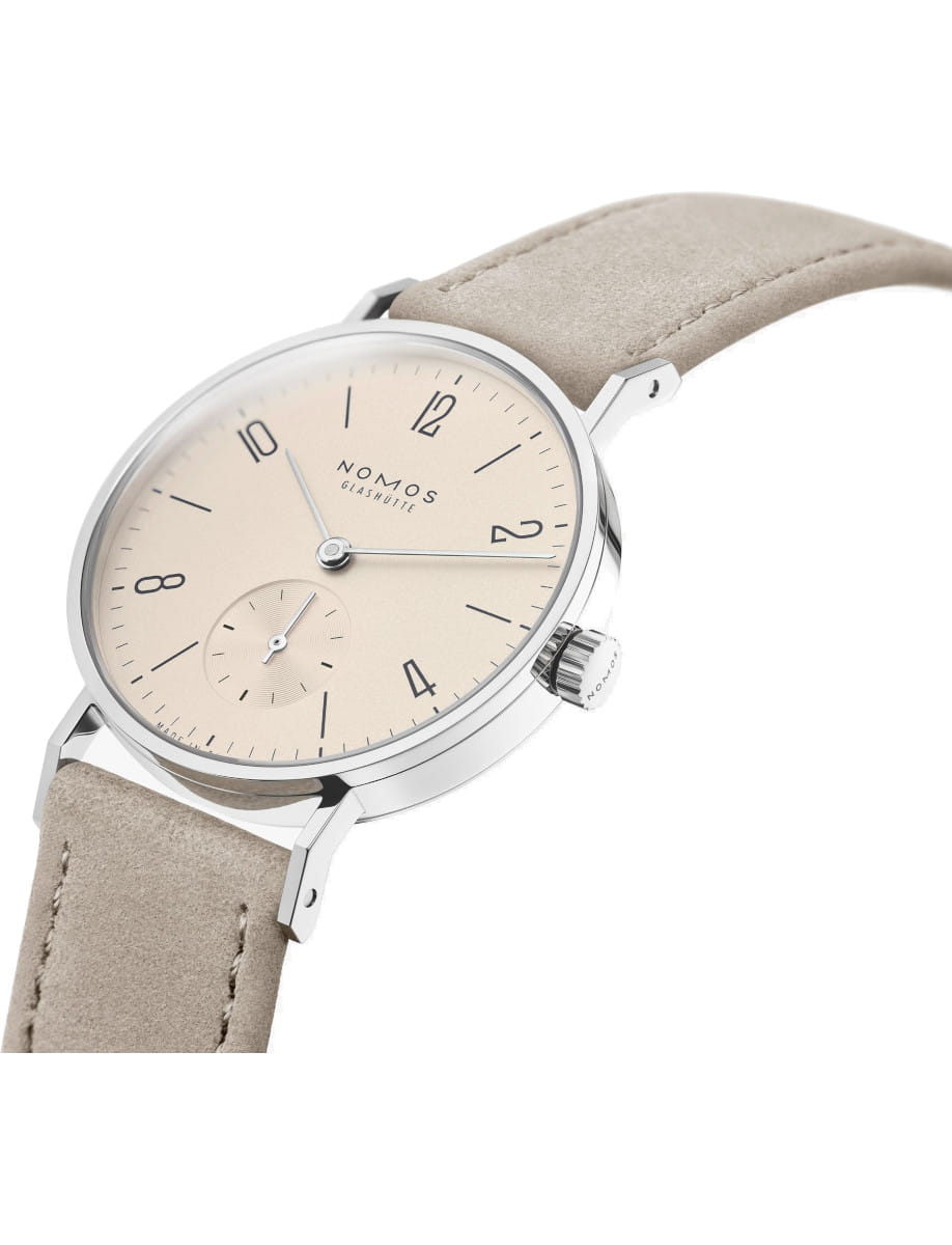 Side view of a Nomos Glashütte wristwatch with champagne dial, steel case, and vegan velour leather strap.