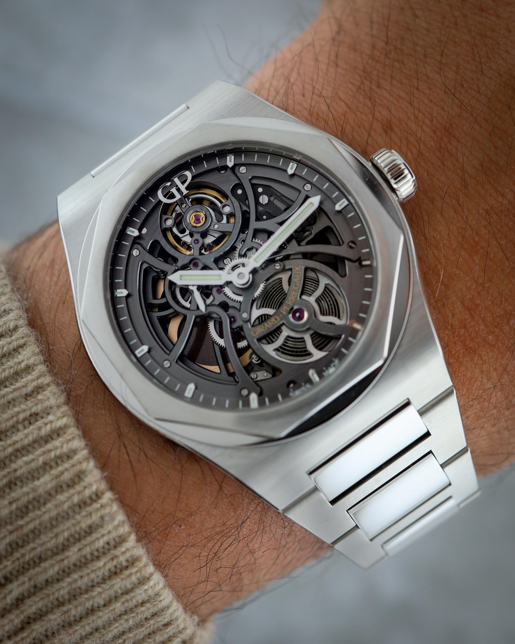 Hotlist image for Girard Perregaux wristwatch with stainless steel case and bracelet, and skeleton dial.