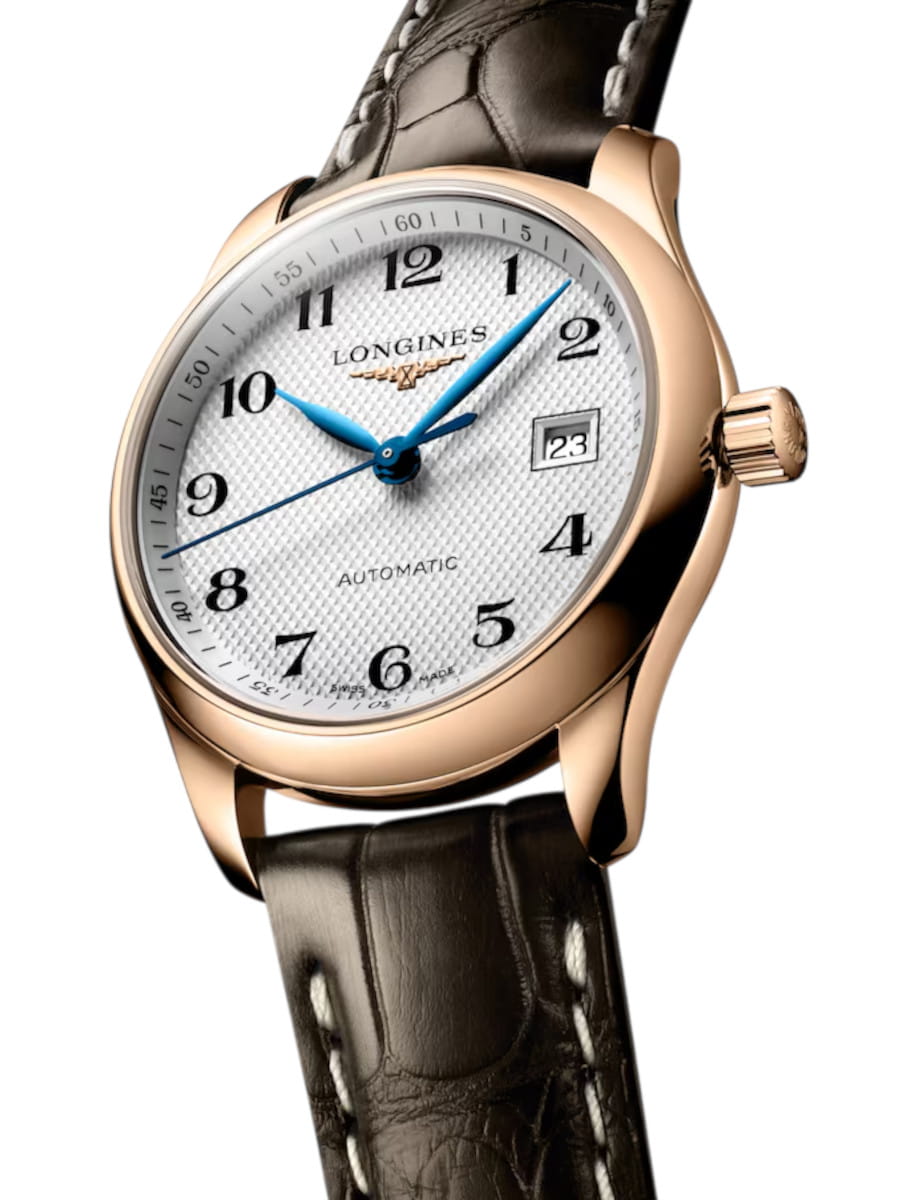 Rose-gold Longines wristwatch with white textured dial, blue hands, date window, on a dark leather strap