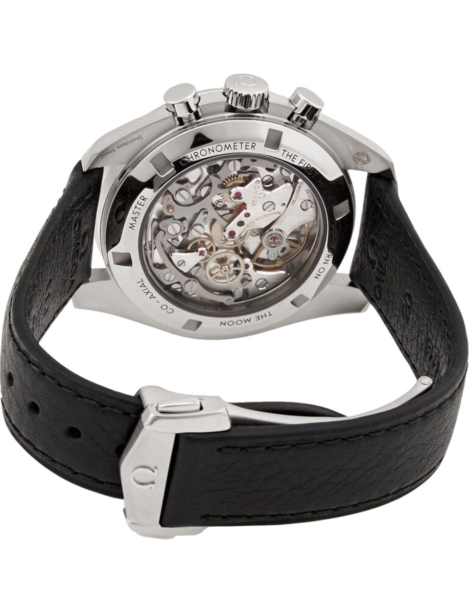 Stainless steel wristwatch with a transparent case back showing the intricate mechanical movement and a black leather strap.