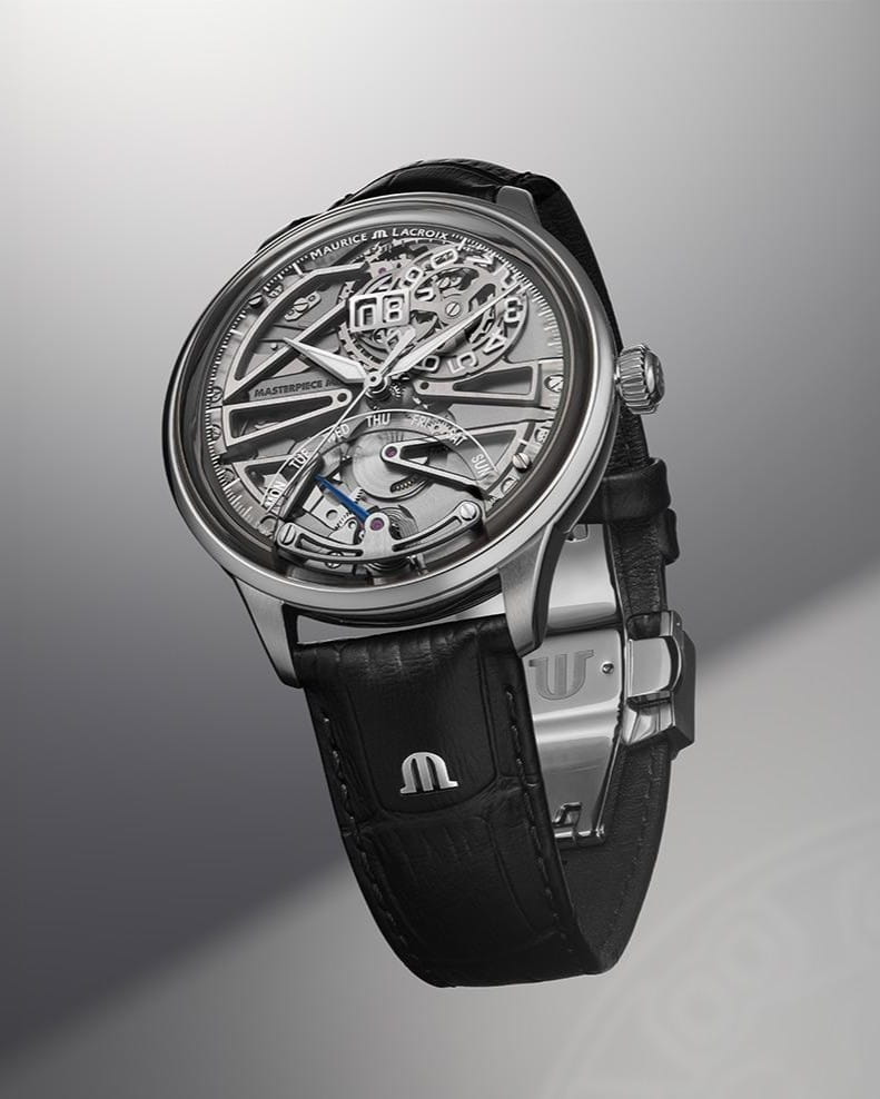 Hotlist image for Maurice Lacroix 1975 wristwatch with stainless steel case, sapphire crystal dial, and black leather strap.