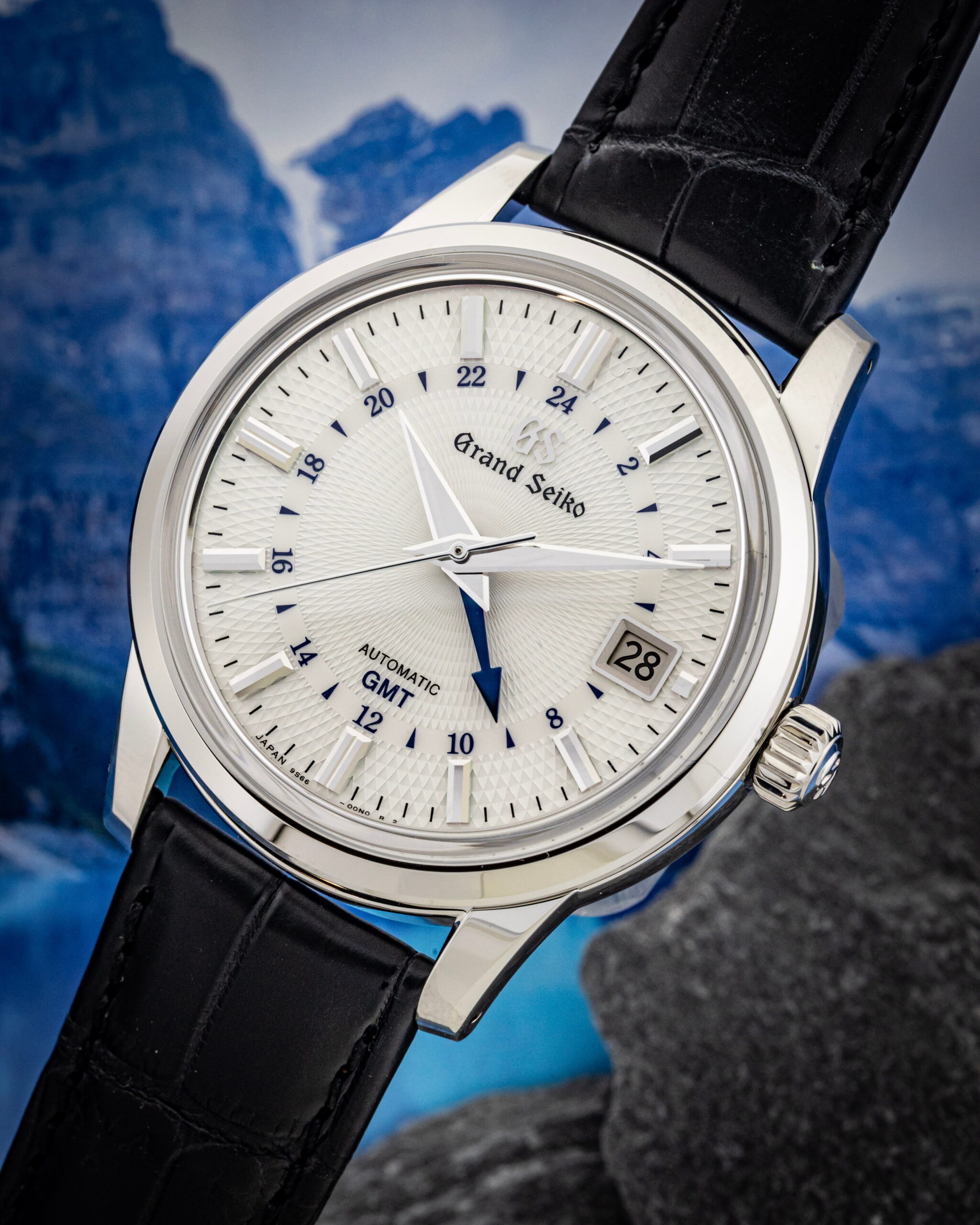 Hotlist image for Grand Seiko wristwatch with stainless steel case, white dial, and black crocodile leather.