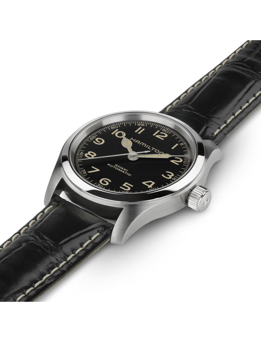 Hamilton Khaki Automatic wristwatch with black dial, cream numerals, and a stitched black leather strap.