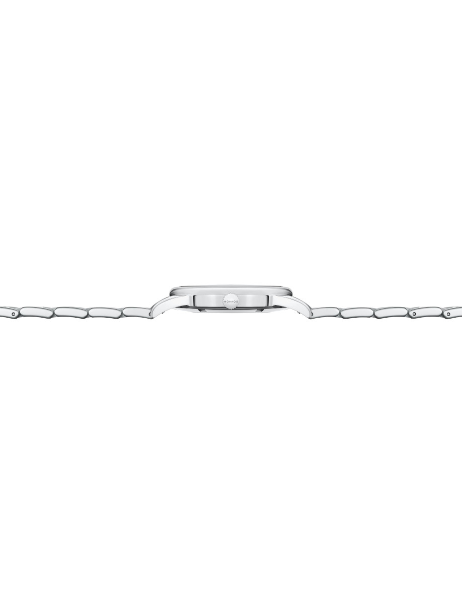 Side view of a stainless steel wristwatch with a black leather strap, showing the slim profile and crown on the side.