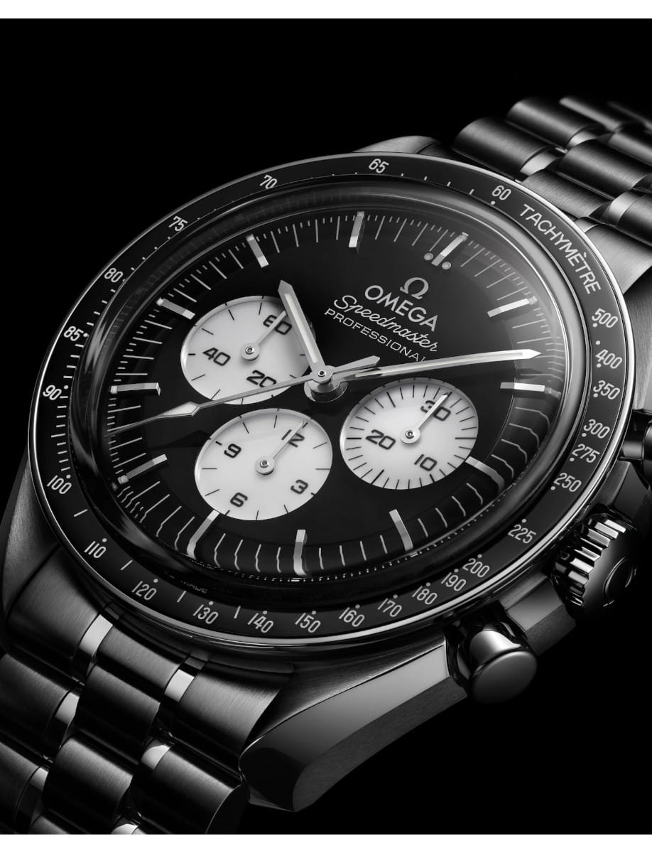 Omega Speedmaster Professional chronograph with black dial, white subdials, and stainless steel bracelet