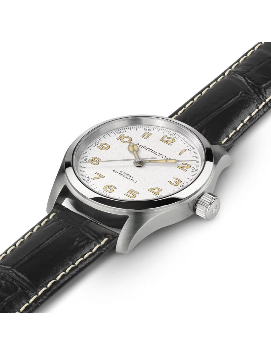 Side view of Hamilton Khaki Automatic wristwatch with white dial, stainless steel case and black calf leather strap