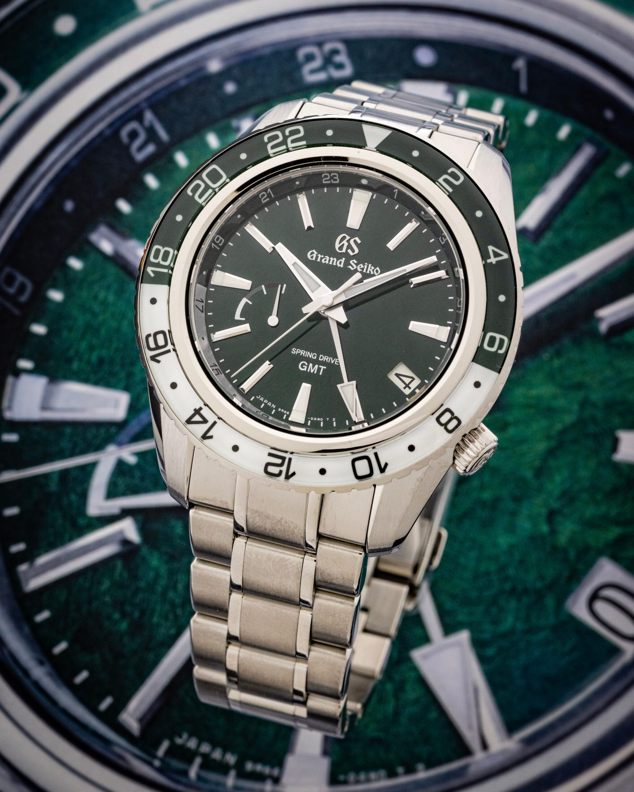 Hotlist image for Grand Seiko Sport wristwatch with stainless steel case and bracelet, and green dial.