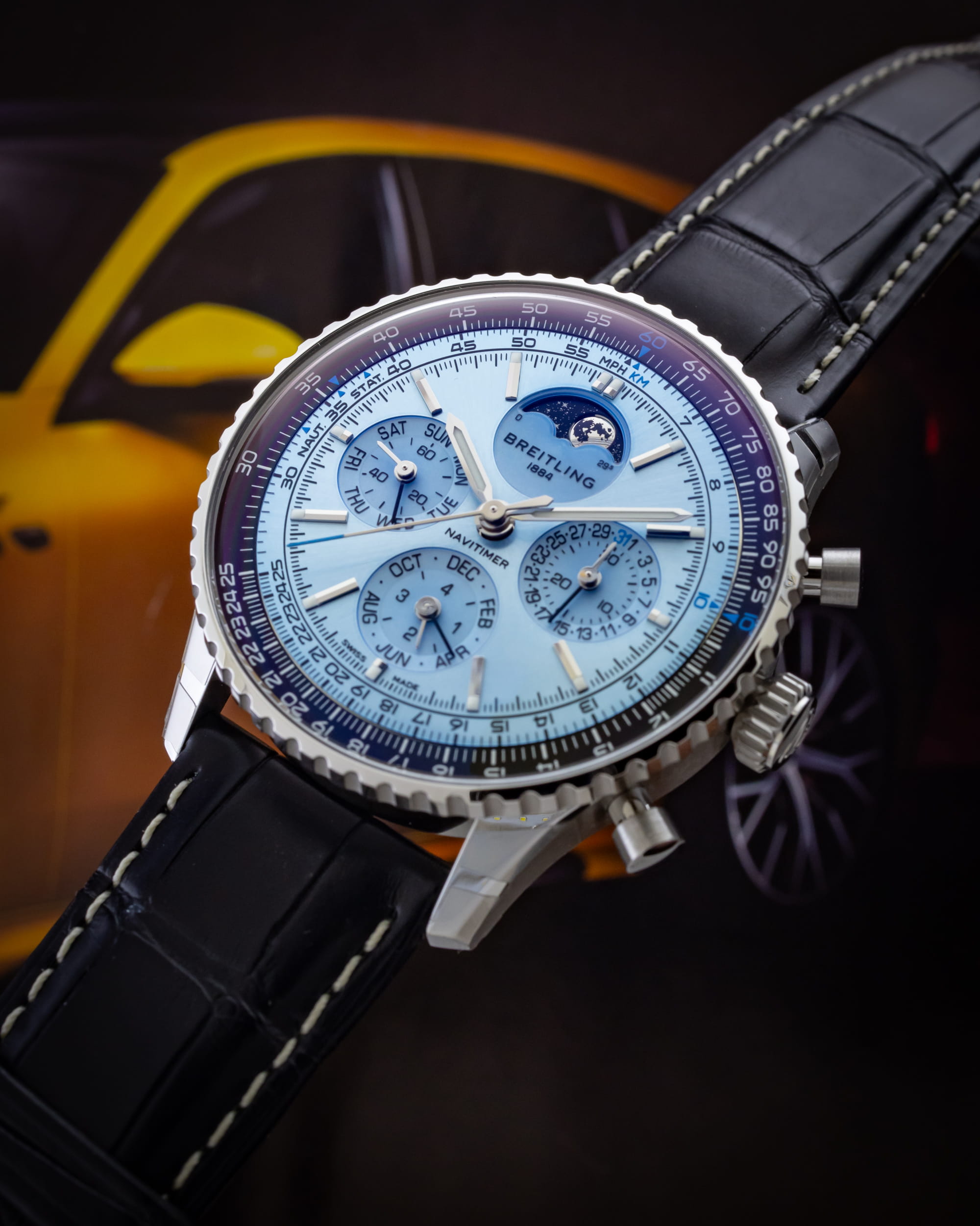 Hotlist image for Breitling wristwatch with stainless steel and titanium case, ice blue dial, and black leather strap.