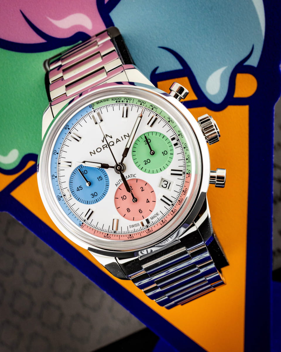 Hotlist image for Norqain wristwatch with stainless steel case and bracelet, and multicolor dial.