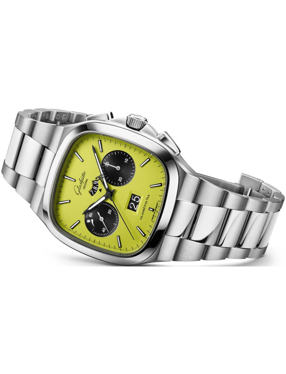 Side view of Glashutte Original wristwatch with stainless steel case and bracelet, and a light green dial.