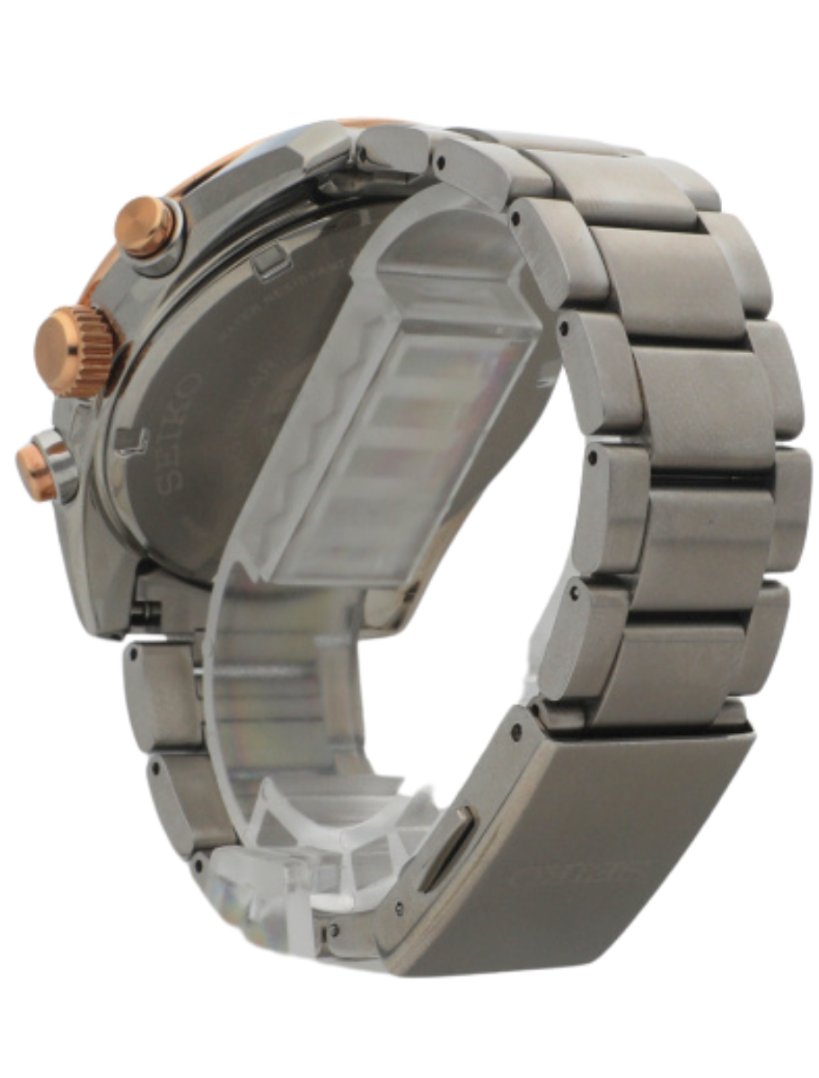 Back left angled view of a pre-owned wristwatch featuring a stainless steel case and bracelet.