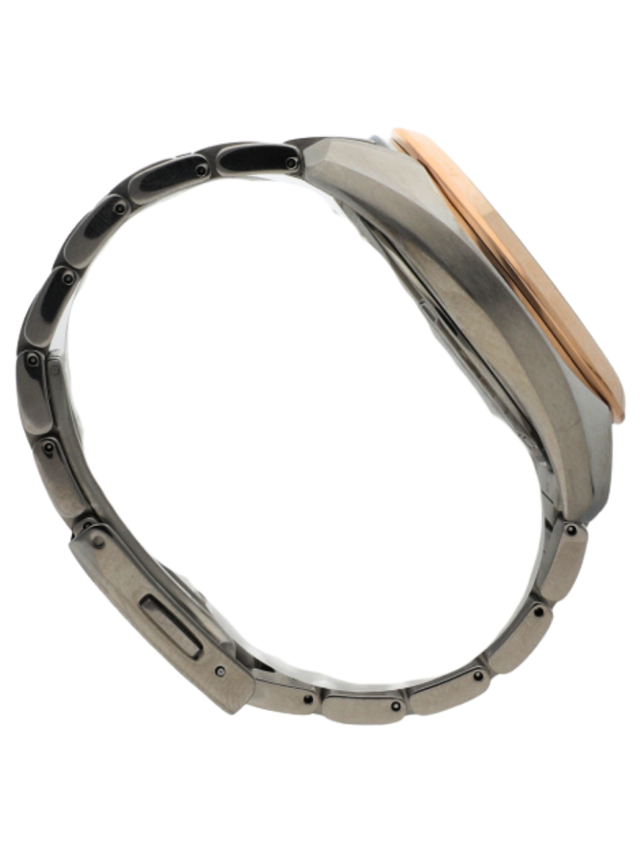 Right angled view of a pre-owned wristwatch featuring a stainless steel case and bracelet.