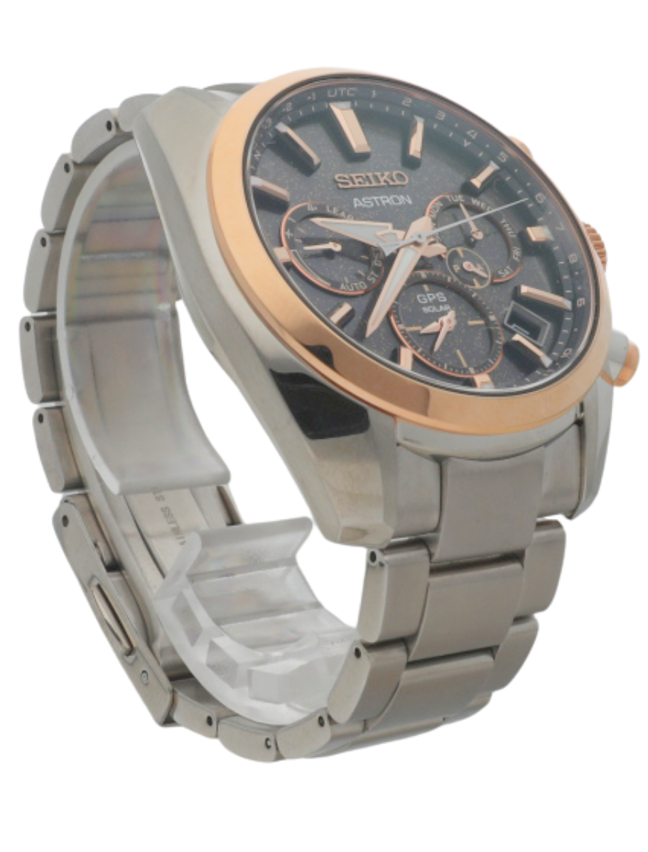 Front-right angled view of a pre-owned wristwatch featuring a stainless steel case, stainless steel bracelet, and black dial.