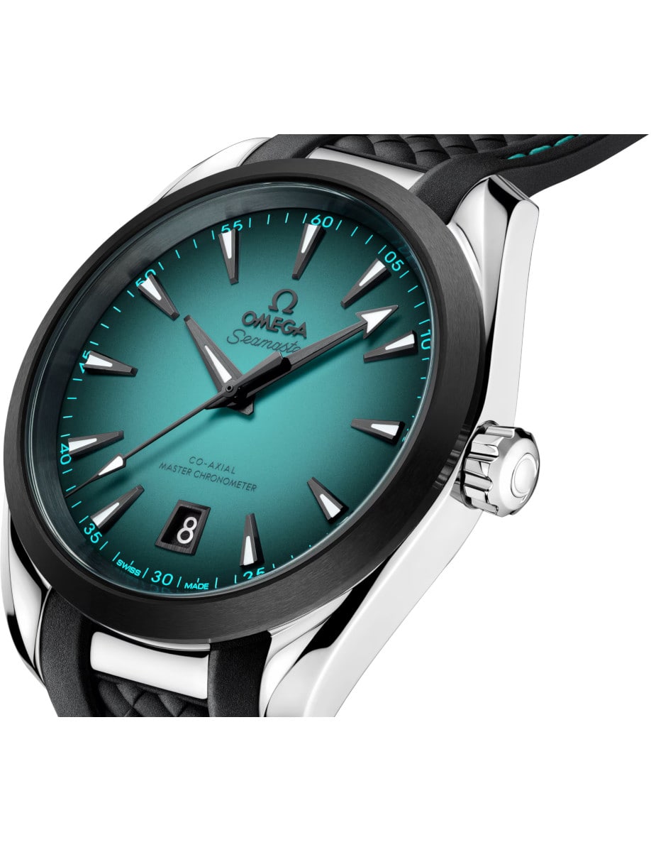 Side view of Omega wristwatch with stainless steel case, black rubber strap, and a turquoise dial.