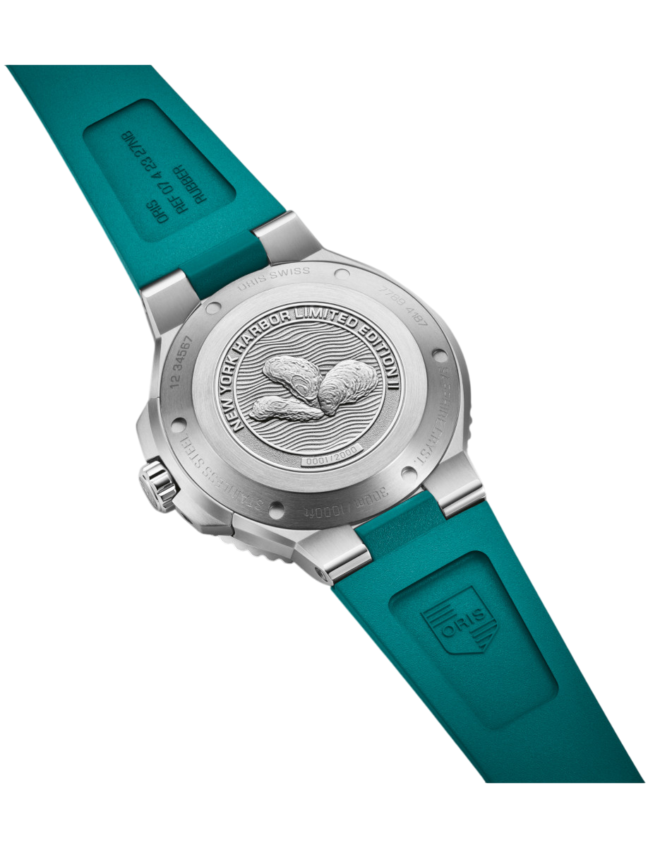 Back view of Oris with stainless steel case, and an aqua green rubber strap.