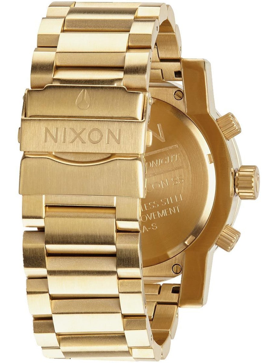 Back view of Nixon wristwatch with gold colored stainless steel case and bracelet