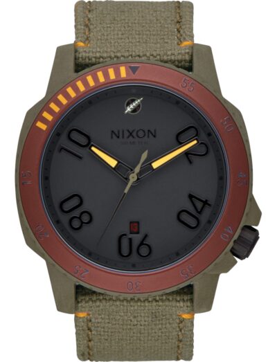Nixon wristwatch with stainless steel case, black dial, and a green textile strap. | Feldmar Watch Co. Nixon wristwatch with stainless steel case, black dial, and a green textile strap.