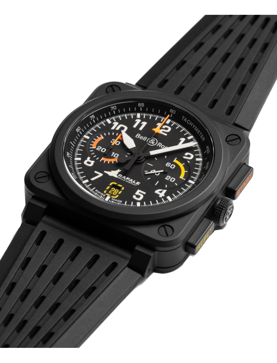 Side view of Bell&Ross wristwatch with micro-blasted black ceramic case, matte black dial, and black openworked rubber and ultra-resilient black synthetic fabric with Rafale Solo Display logo marking.