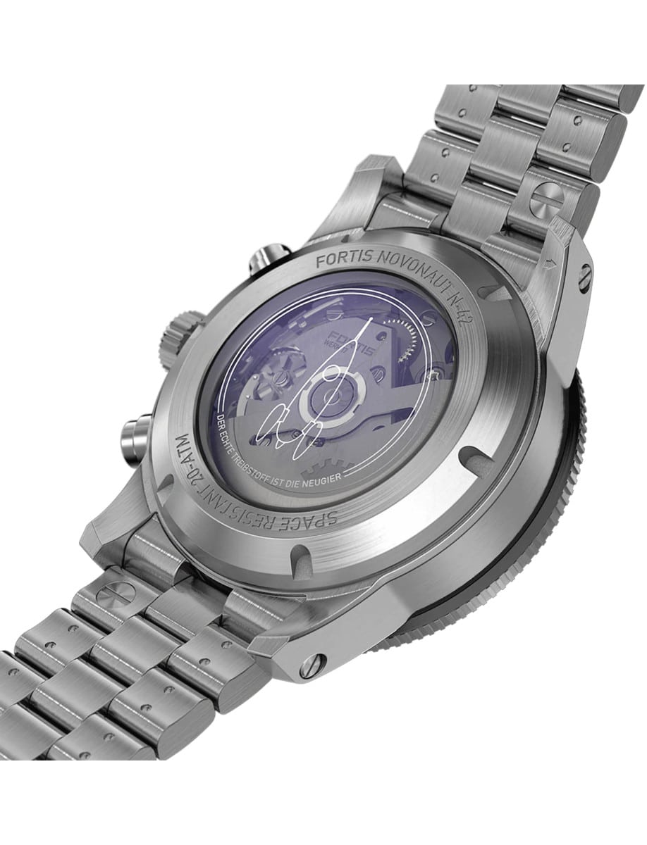 Case back of a wristwatch with a recycled stainless steel case and bracelet, showing the automatic movement.
