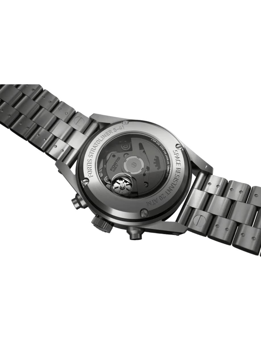 Back view of a Fortis wristwatch with a recycled stainless steel case and bracelet, showing the automatic movement through the transparent caseback.