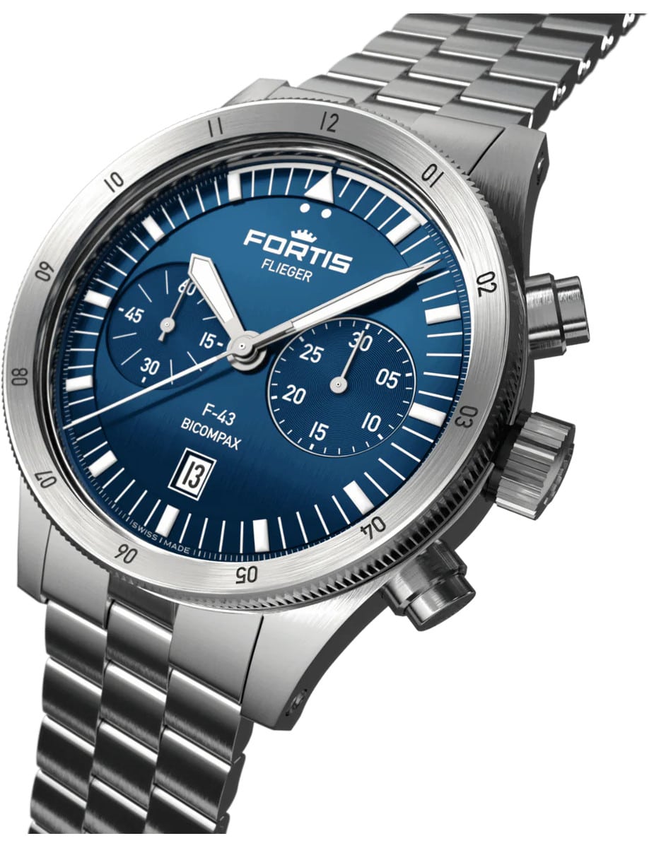 Side view of Fortis wristwatch with recycled stainless steel case and bracelet, and a blue dial