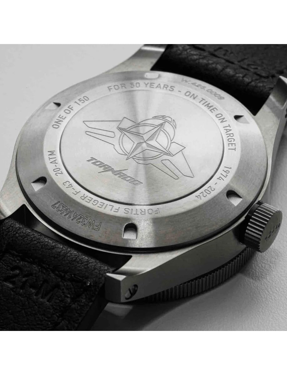 Back view of a titanium wristwatch case with ultra-engraving.