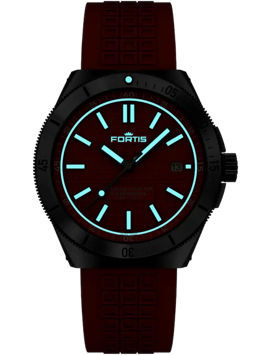 Night photo of Fortis wristwatch with Superluminova®X1 with blue glow