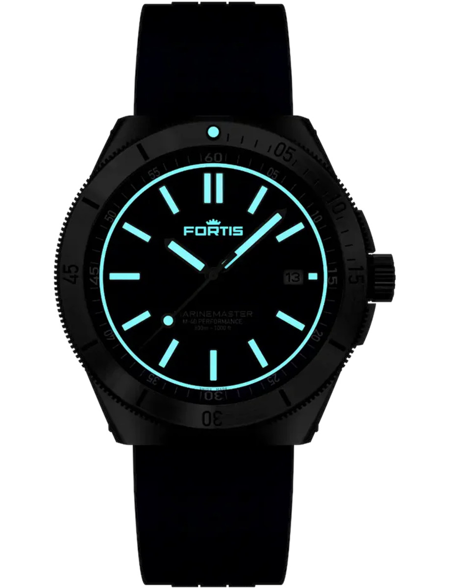 Night photo of Fortis wristwatch with Superluminova®X1 with blue glow