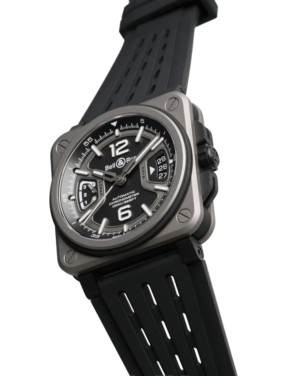 Side view of Bell & Ross wristwatch with titanium case, matt black dial and black rubber strap