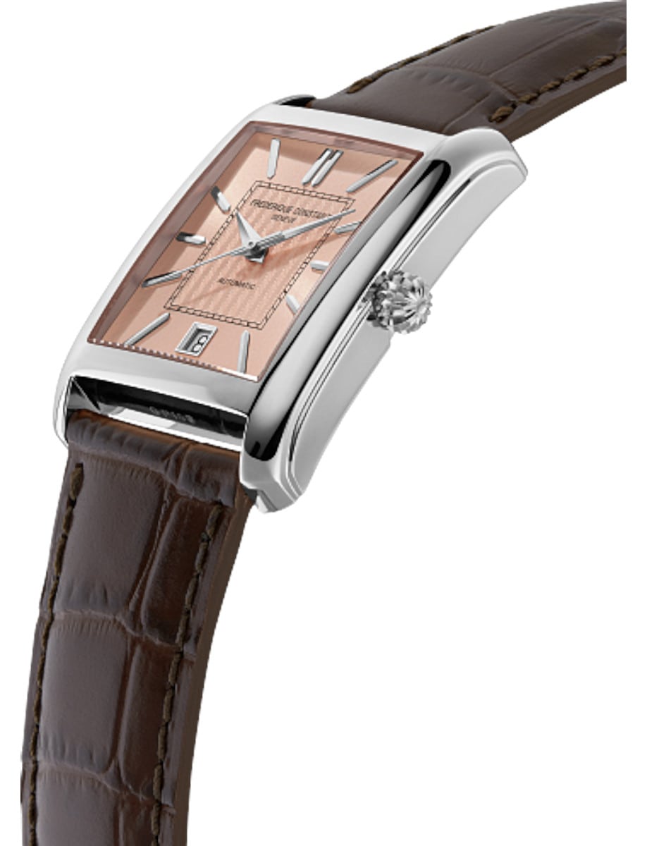 Side view of Frederique Constant wristwatch with stainless steel case, salmon dial and leather strap