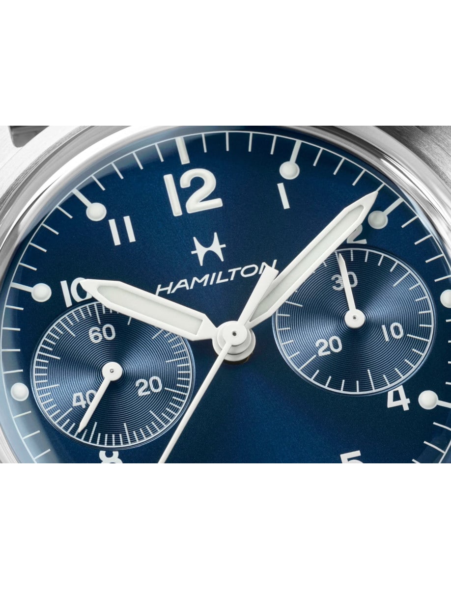 Close view of blue dial of Hamilton wristwatch with stainless steel case.
