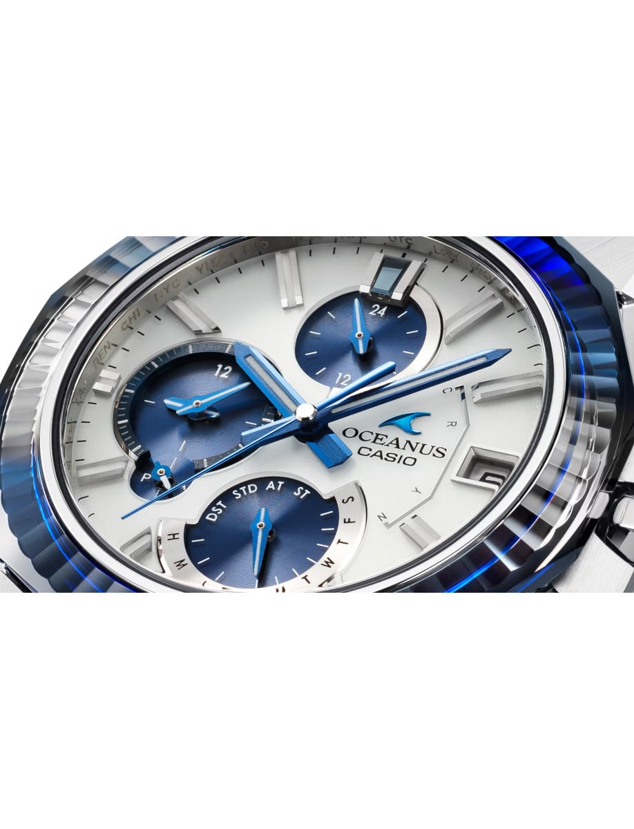 Close view of dial from Casio wristwatch with titanium case, silver and blue dial.