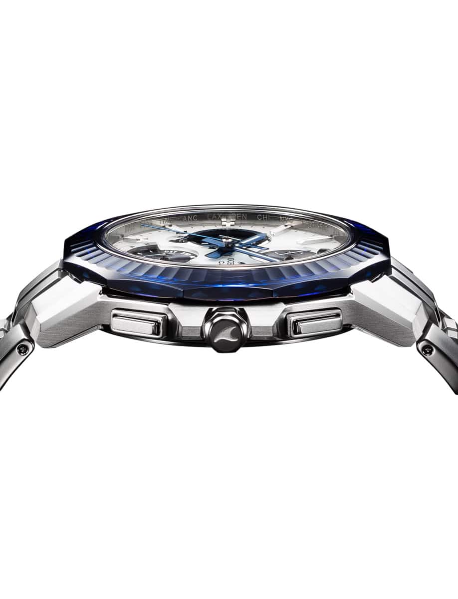 Side view of Casio wristwatch with titanium case and bracelet, silver and blue dial.