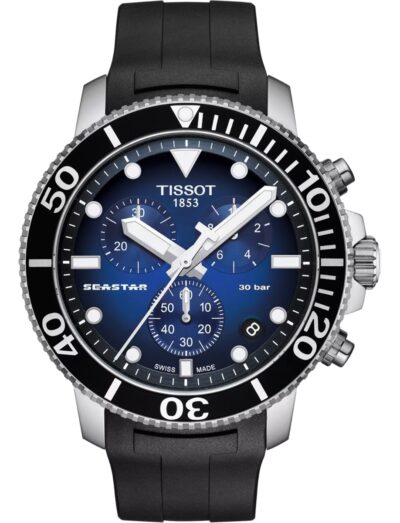 Tissot wristwatch with stainless steel case, graded blue-black dial, and black synthetic strap.