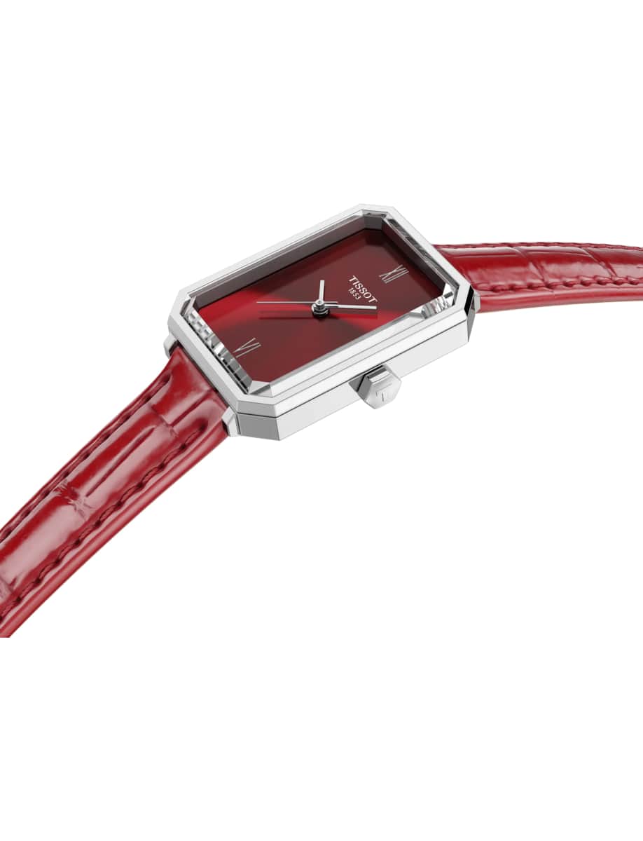Side view of Tissot wristwatch with stainless steel case, red dial and leather strap