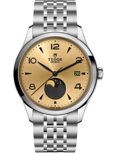 Tudor wristwatch with stainless steel case and bracelet, and champagne-color satin sun-brushed dial with applied numerals and moon phase indicator.