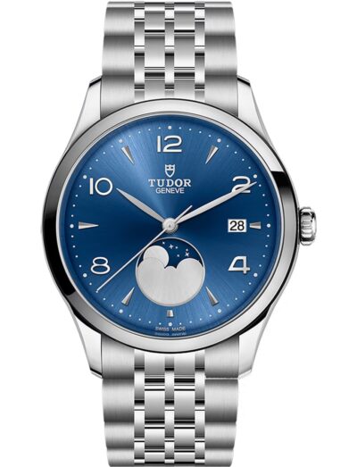 Tudor wristwatch with stainless steel case and bracelet, and blue satin sun-brushed dial with applied numerals and moon phase indicator.