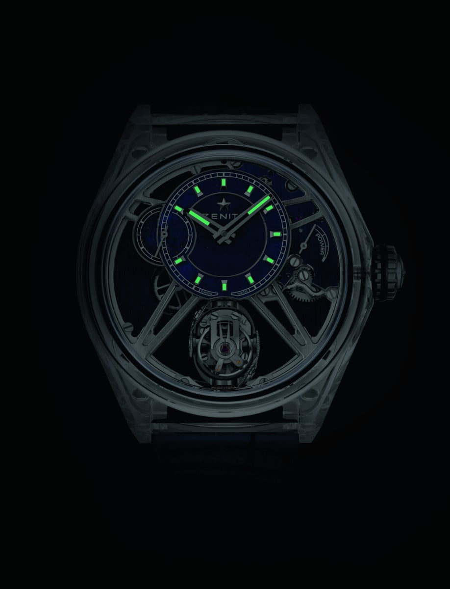 Night view of Close view of Zenith wristwatch with full sapphire case, and lapis lazuli dial with luminous hands and indexes.