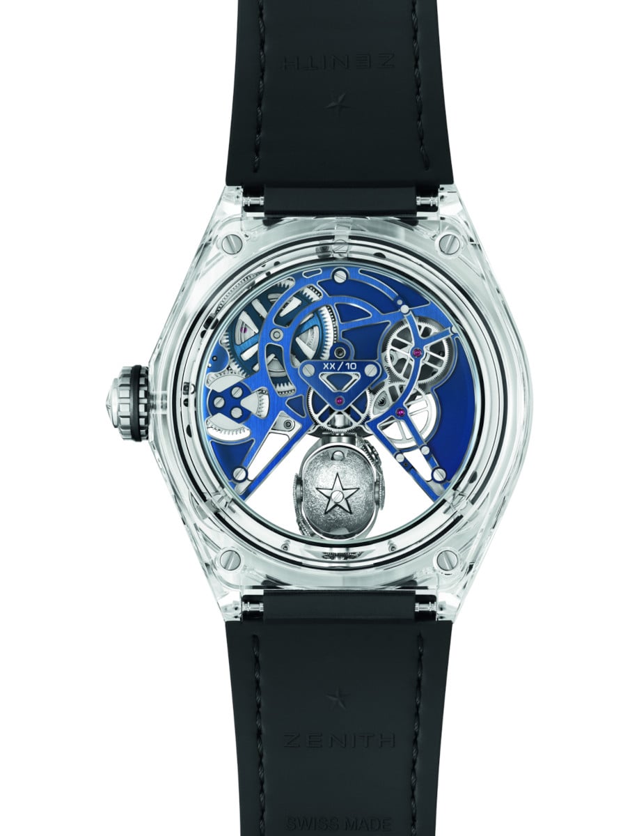 Back view of Zenith wristwatch with full sapphire case, blue integrated alligator leather strap, and transparent case back.