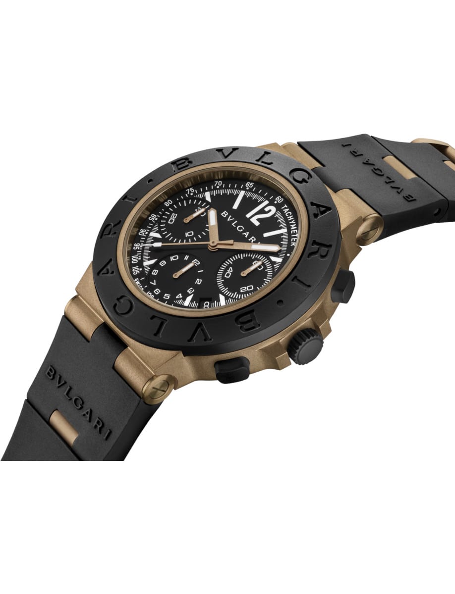 Side view of Bulgari wristwatch with bronze case, black rubber bezel and bracelet, and matte varnish black dial.