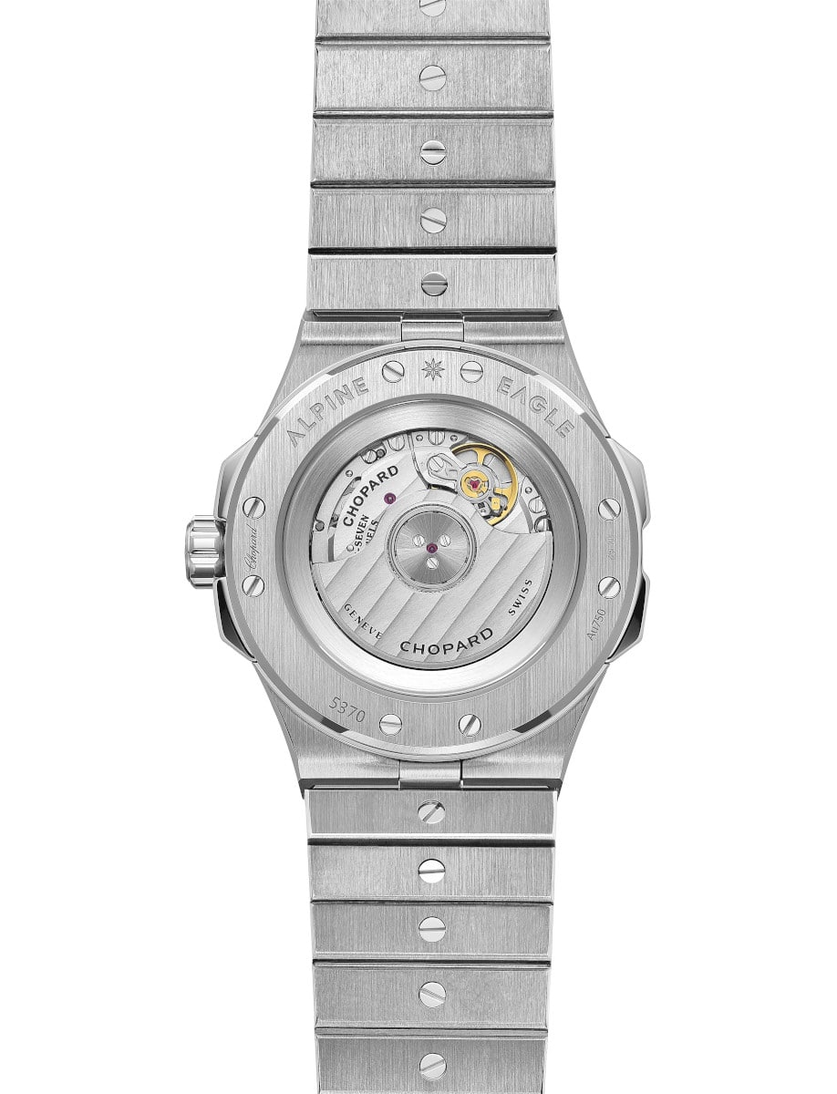 Back view of Chopard wristwatch with white gold case and bracelet, and transparent case back.