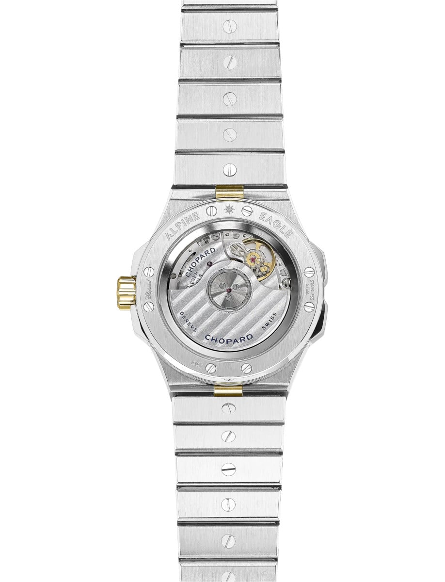 Back view of Chopard wristwatch with18k yellow gold and stainless steel case and bracelet and transparent caseback