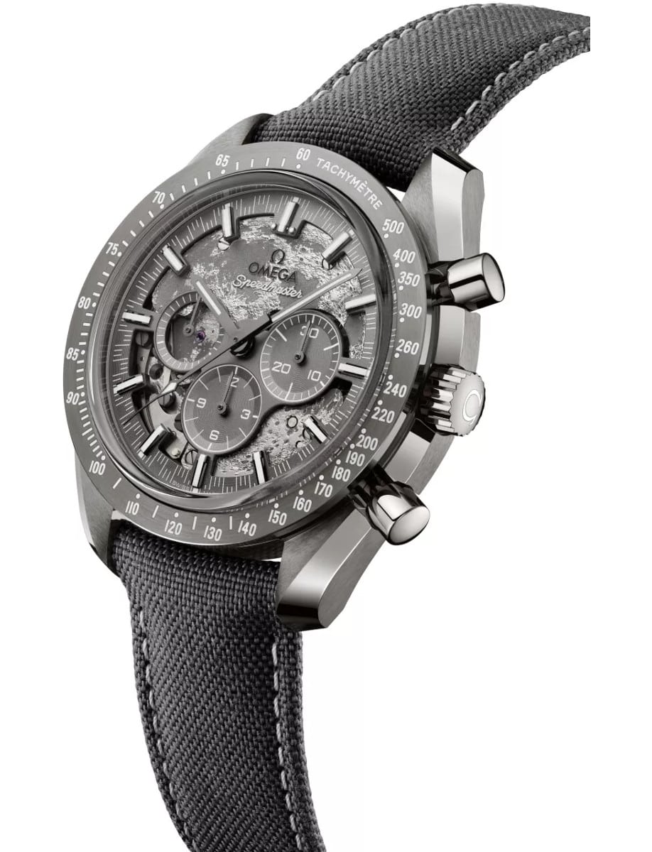 Side view of Omega wristwatch with grey ceramic case, grey dial and grey nylon fabric strap