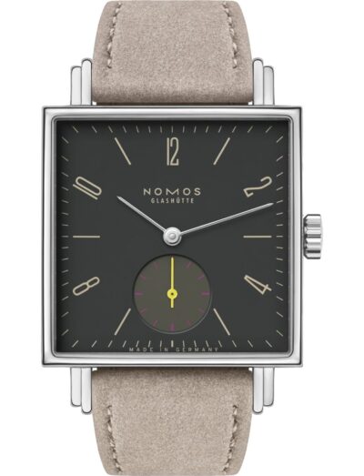 Nomos wristwatch with stainless steel case, anthracite dial, and vegan velour remborde beige strap.