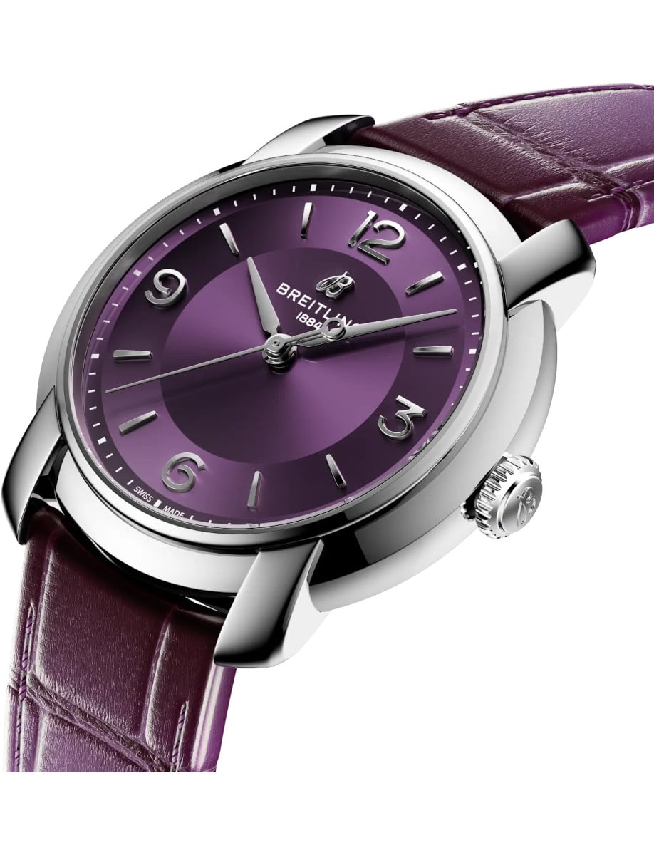 Side view of Breitling wristwatch with stainless steel case, purple dial, and purple alligator leather.