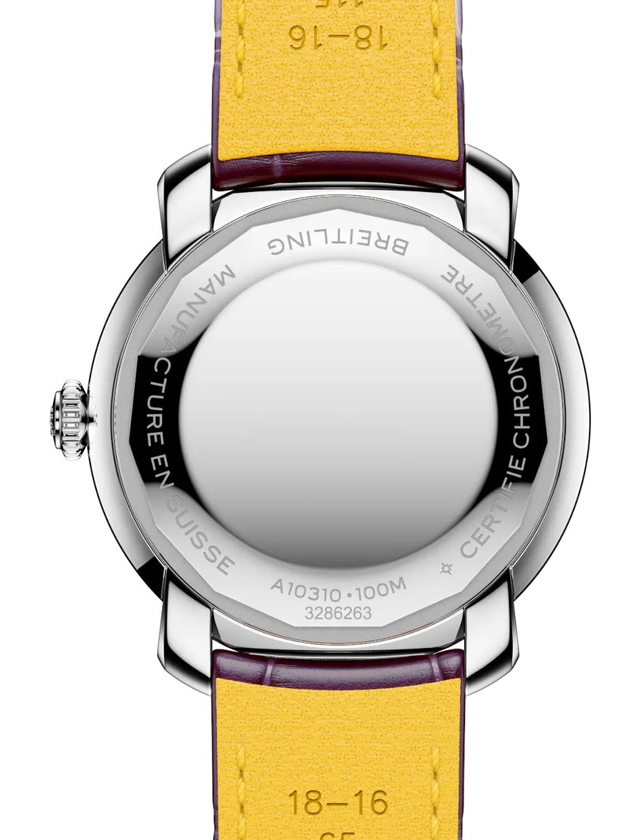 Back view of Breitling wristwatch with stainless steel case, and purple alligator leather.
