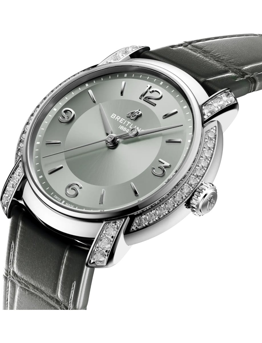 Side view of Breitling wristwatch with stainless steel case with diamonds, grey dial, and grey alligator leather.