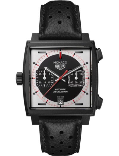 Tag Heuer wristwatch with titanium case, black and silver dial, and black leather strap.