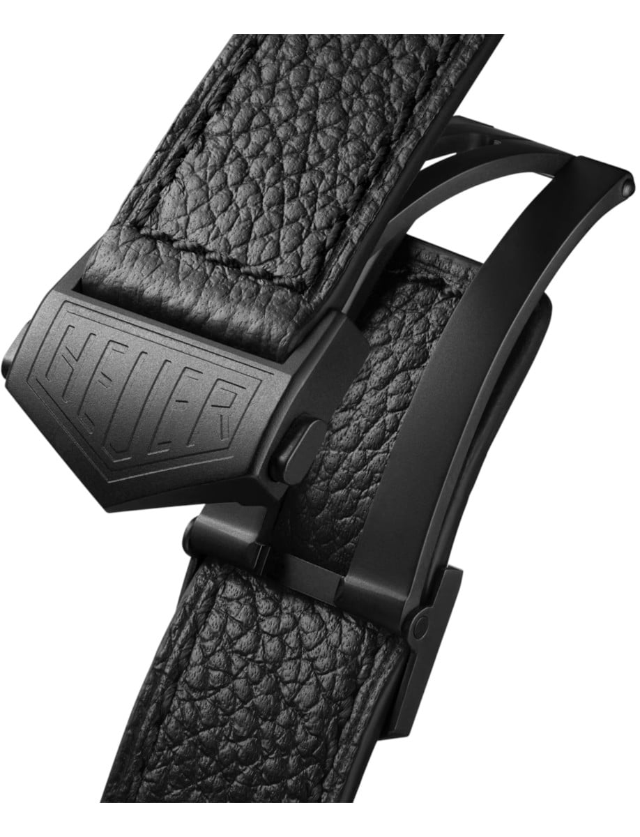 Tag Heuer black leather strap with titanium buckle.